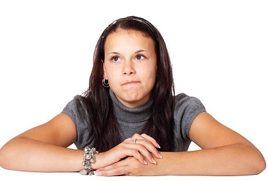 Girl thinking of her cat
