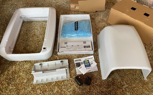 Photo of ScoopFree Crystal Pro unpacked showing all what comes in the box