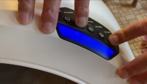 Pressing cycle and connect buttons to onboard the Litter Hopper