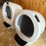 Side view of the Litter-Robot 4 and Litter-Robot 5 placed next to each other